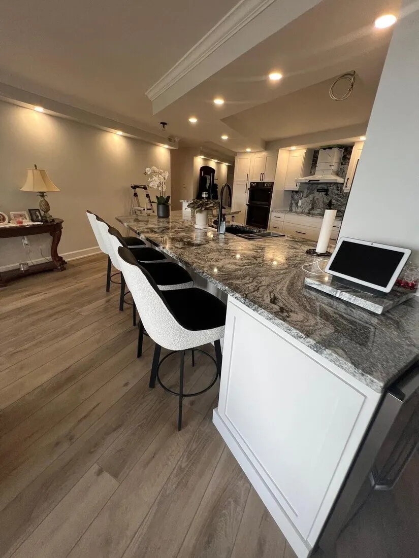 Kitchen with a granite island and bar seating